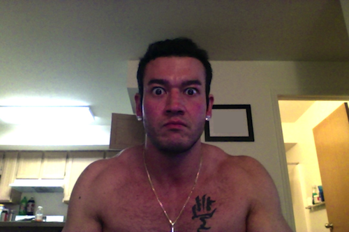 webcam earrings and tattoo